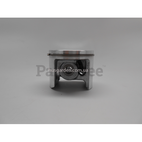 Поршень у к-ті